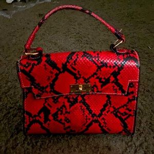 Twist Lock Snakeskin Purse